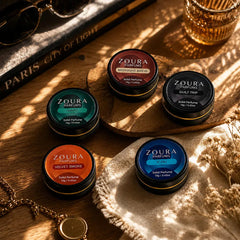 Zoura Parfums Elite Solid Perfume Collection on wooden tray