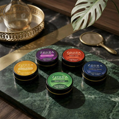 Zoura Parfums Prestige Solid Perfume Collection on marble tray