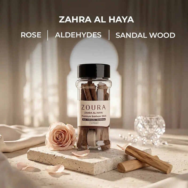 Zoura Zahra Al Haya bakhoor sticks jar with rose, aldehydes, and sandalwood notes styled with a pink rose and sandalwood
