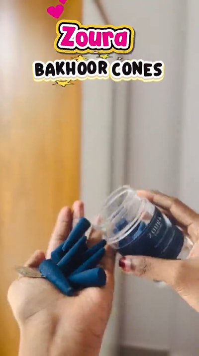 Zoura Parfums Bakhoor Cones jar, Royal Cypress Smoke scent, held in hand for a video showcase.