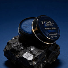 Arabian Musk unisex solid perfume balm texture, open jar by Zoura Parfums