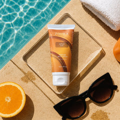 Zoura Aurum Oud body lotion 50g with a warm woody, amber and sandalwood scent profile