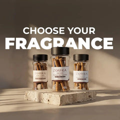 Zoura bakhoor sticks trio – choose your fragrance: Zahra Al Haya, Oud Noir, and Oud Eclat displayed on a stone pedestal