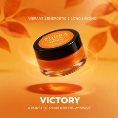 Zoura Victory long lasting deodorant cream – vibrant, energetic fragrance jar floating on orange backdrop, "A Burst of Power in Every Swipe"
